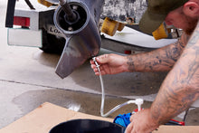 Load image into Gallery viewer, Here is an example of how to use the Lower Unit Gear Oil Pump to change the lower unit gear oil on a Yamaha outboard motor.