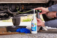 Load image into Gallery viewer, In this example of how to use the Quart Bottle Fluid Pump, the pump is being used to change the rear differential fluid on a Jeep Wrangler.
